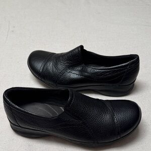 Clarks Women's Black Leather Slip-On Shoes.